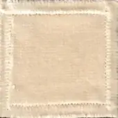 Beige textile sample with mottled texture, framed by a light beige, irregular stitched border; “swan > fabric (elite) > elite 307” text visible.
